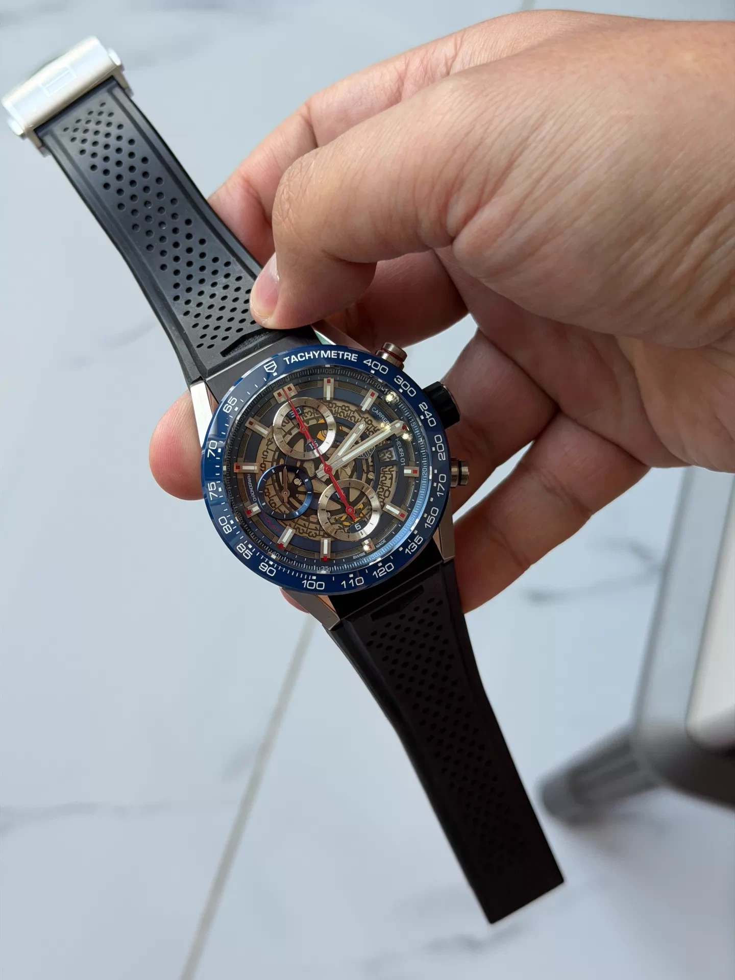 tag-heuer-carrera-skeleton-chronograph-blue-bezel-heuer01-style-rubber-strap-4